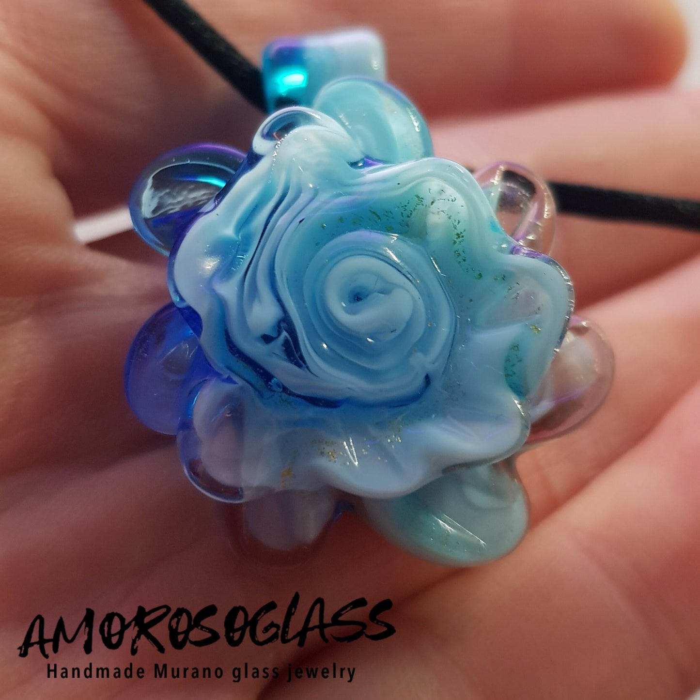 DALIA - colore celeste/blu in vetro di Murano lavorato a lume.