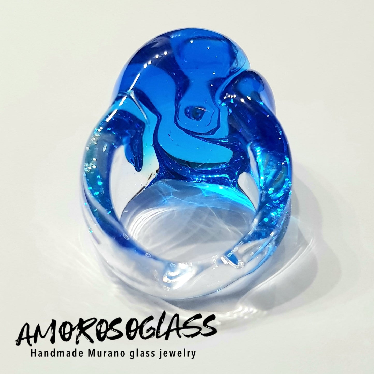 Anello BOCCIOLO in vetro di Murano colore acquamare con base anello in cristallo trasparente.
