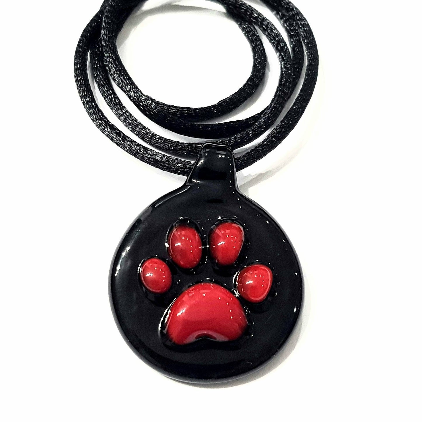 Impronta di zampetta di gatto in vetro di Murano lavorato a lume.