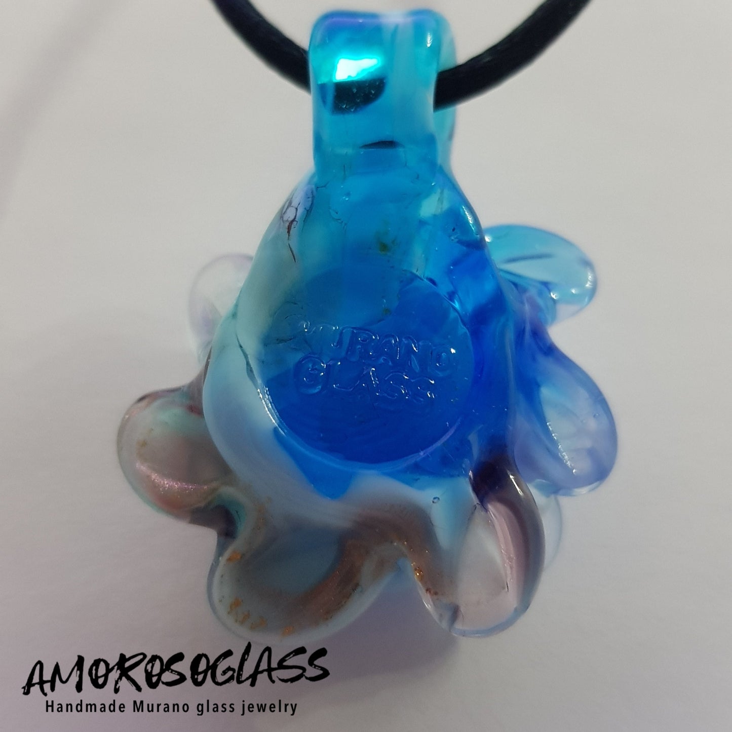 DALIA - colore celeste/blu in vetro di Murano lavorato a lume.